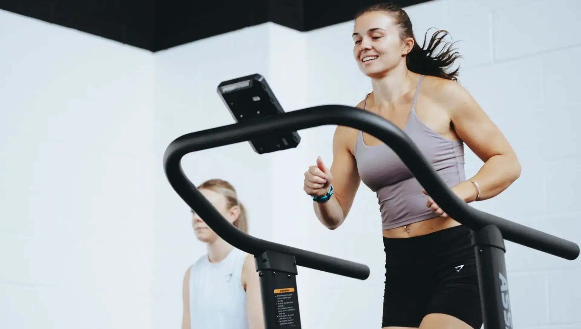 Women running on treadmill